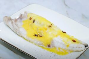 lubina en salsa de naranja paso final
