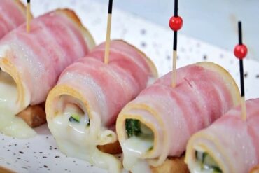 Rollitos de calabacín rellenos y envueltos en beicon principal