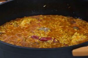 arroz meloso con pollo y setas paso final