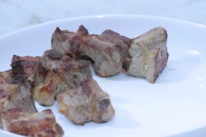 costillas con pisto paso 1